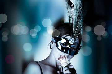 beautiful woman with mask and wine .