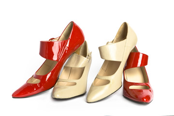Two pairs new elegant ladies' shoes on a high heel