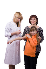 Doctor giving little girl an injection