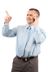 Young businessman using mobile phone