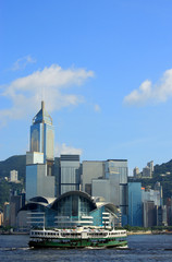 Fototapeta premium Hong Kong skyscraper with ferry