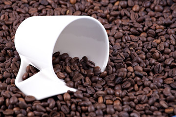 Coffee beans and cup