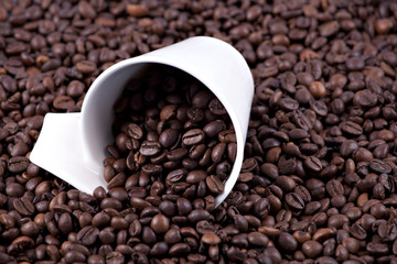 Coffee beans and cup
