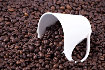 Coffee beans and cup