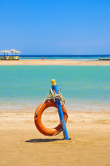 Life buoy on the beach of Egypt © Evgeny Korshenkov