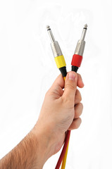 Hand Holding Audio Cables