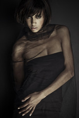 Naklejka premium Studio Shot of Beautiful Young Brunette Girl