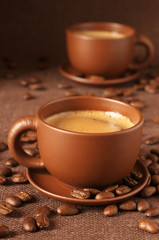 Cups of coffee and beans