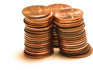 Tower of copper colored pennies