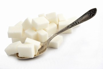lump sugar and silver spoon