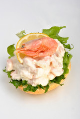 some fresh king prawns on bread roll