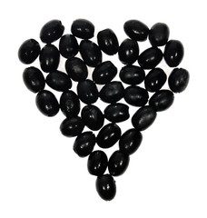Olives in the form of heart on the white background