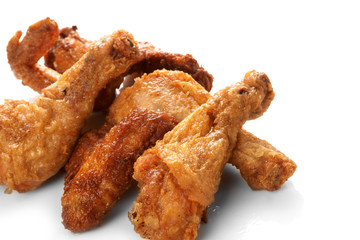Chicken legs on the white
