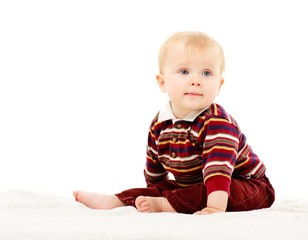 baby boy sitting on a white background