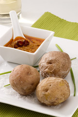 Spanish cuisine. Mojo picon and papas arrugas. Red mojo sauce.