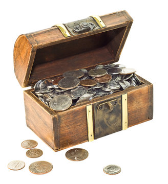 Wooden chest overfilled with coins
