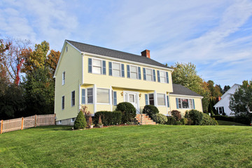Yellow New England Style colonial house - 19706403