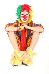 clown enfant assis