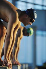 young swimmmer on swimming start