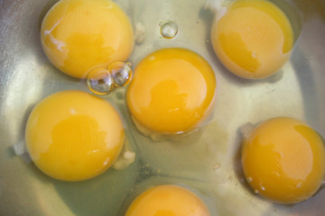 Yolks and whites of eggs in a bowl