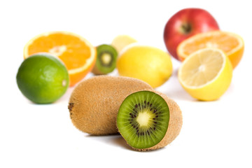 Fototapeta na wymiar Kiwi with other tropical and citrus fruit