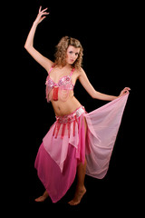 Belly dancer isolated on a  black background