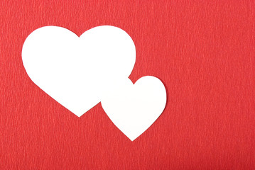 Double heart in red background
