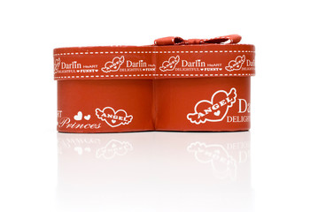 hand-made beautiful red heart gift box in white background