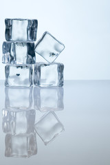 pile of ice cubes with reflection