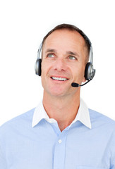 Attractive businessman using headset