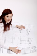 Frau mit Bauplan