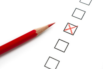 Survey Questionnaire with Red Pencil and X