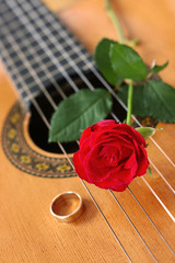 Classical Guitar with Red Rose