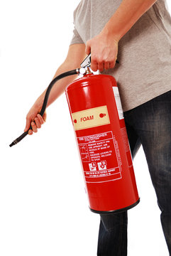 Man Using Fire Extinguisher