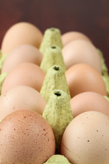 Box with brown eggs