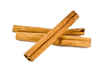 Cinnamon sticks on white
