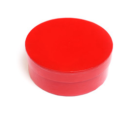 closed red round box isolated on white