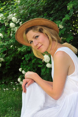 Young woman resting in garden