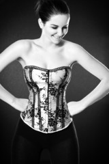 Smiling woman wearing a corset