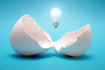 From the broken egg the shone lamp is pulled out.