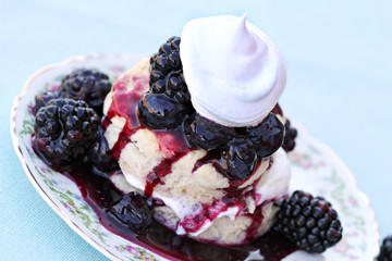 Biscuits with blackberries and blueberries.