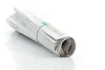 Rolled up newspaper