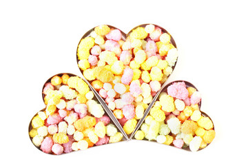 three hearts filled with candy