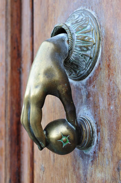 door knocker hand