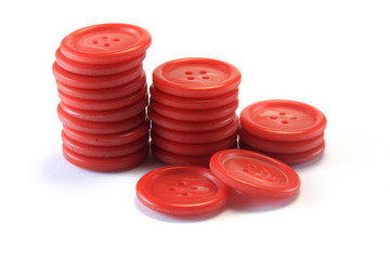 sawing red buttons