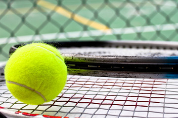 Tennis ball, racket & court