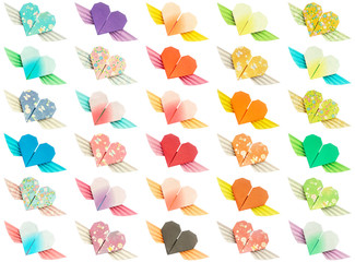 30 colorful winged-hearts isolated on a white background
