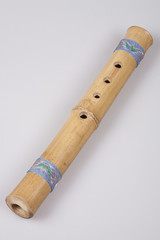 bamboo flute on a light background