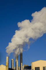 Power plant on a winter day, sunset