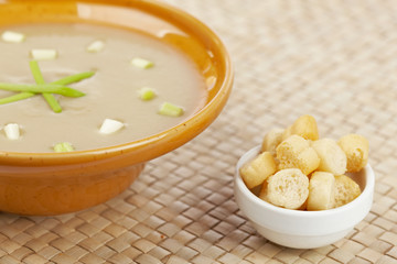 Cream of mushroom soup and bread croutons